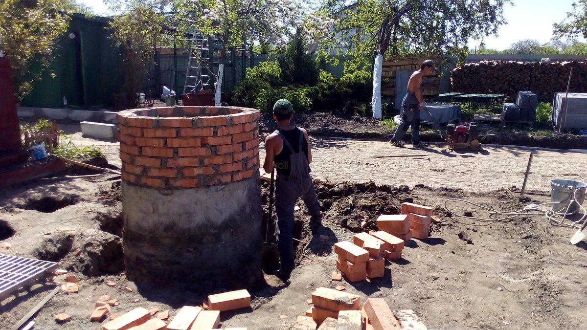 Выполнение работ по укладке газонной решетки и тротуарной плитки